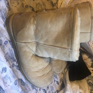 Used furry winter ugg boots, tan colored
